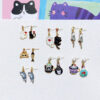 Wholesale Cartoon Cute Asymmetric Black and White Cat Earrings