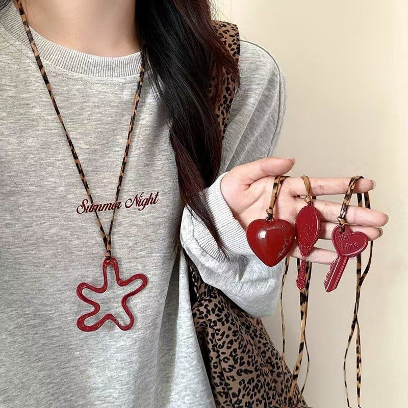 Wholesale Red hollow flower heart-shaped necklace