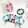 Wholesale Cross Silicone Leopard Beaded Wrist Keychain Bag Austrian Pendant