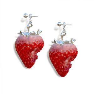 A pair of red strawberry earrings
