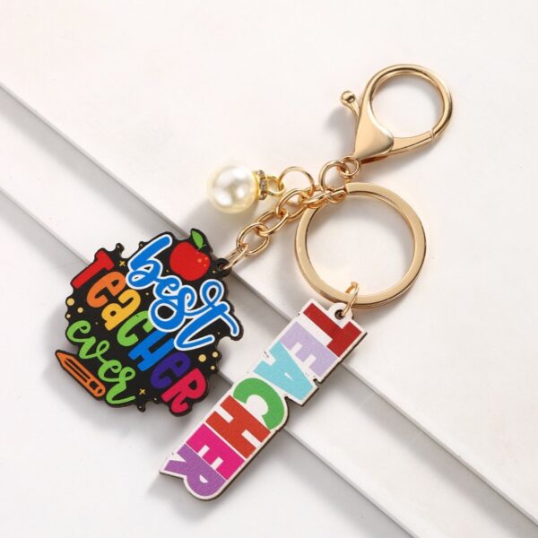 Wholesale Campus style graduation season wooden book keychain