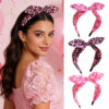 Wholesale Valentine's Day headband with bow, bunny ears, and a pink heart shape