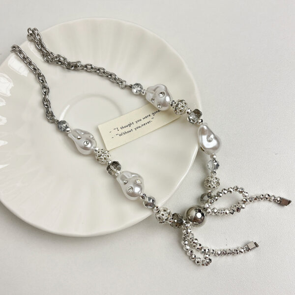 Wholesale Sparkling pearl bow tassel necklace