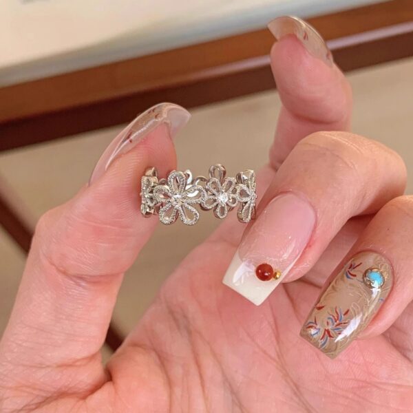 O1CN01LmpMvr1mLery95DoB_2213366304938-0-cib Wholesale Copper Zircon Lace Hollow Five-Petal Flower Ring