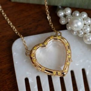 Heart-shaped full pave yellow diamond glass necklace (empty box)