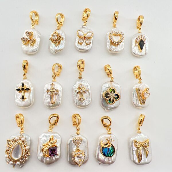 O1CN01LuVPel1bndG4u8MM9_2217774803510-0-cib Wholesale Copper gold-plated inlaid pearl shell cross butterfly heart pendant