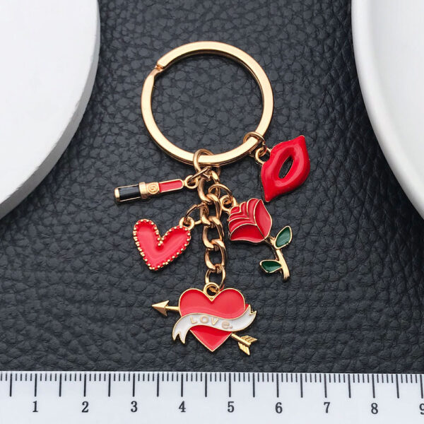 O1CN01M0ShTS2Kpbcc3l9uD_2217654629606-0-cib Wholesale Red Cartoon Lipstick Bag Love Rose Keychain