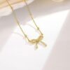 Wholesale Golden creative bow pendant stainless steel necklace