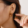 Wholesale Stainless steel 18K gold-plated hollow irregular U-shaped earrings