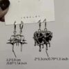 Wholesale Gothic liquid heart-shaped pendant earrings