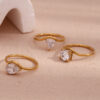 O1CN01MpDJCU2AUrP4sLRdH_2213308878207-0-cib Wholesale ins fashion light luxury wave ring Golden zircon ring stainless steel plated 18k simple all-Match ring