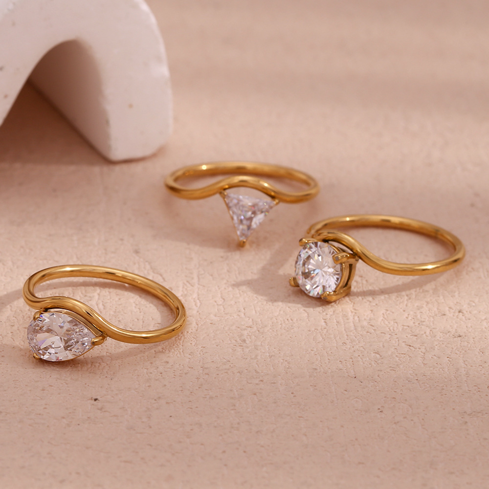 Wholesale European and American ins fashion light luxury wave ring Golden zircon ring stainless steel plated 18k simple all-Match ring
