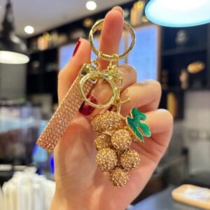 Fully rhinestone-encrusted simulated grapes (champagne color) / 5.3*3.7