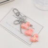 Wholesale Macaron-colored heart metal bow keychain