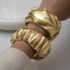 O1CN01N4J0lw1lWouGbHfg7_2218670844827-0-cib Wholesale Golden wide edged wave band exaggerated bracelet