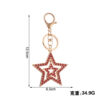 Wholesale Five pointed star hollow diamond inlaid metal keychain