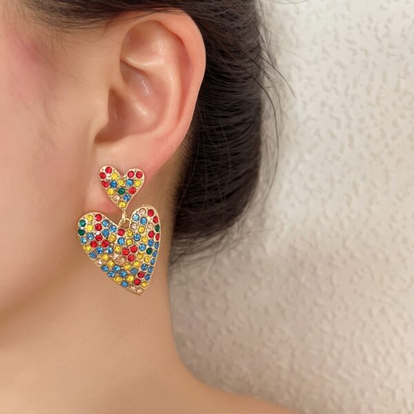 Wholesale love inlaid pearl diamond alloy earrings