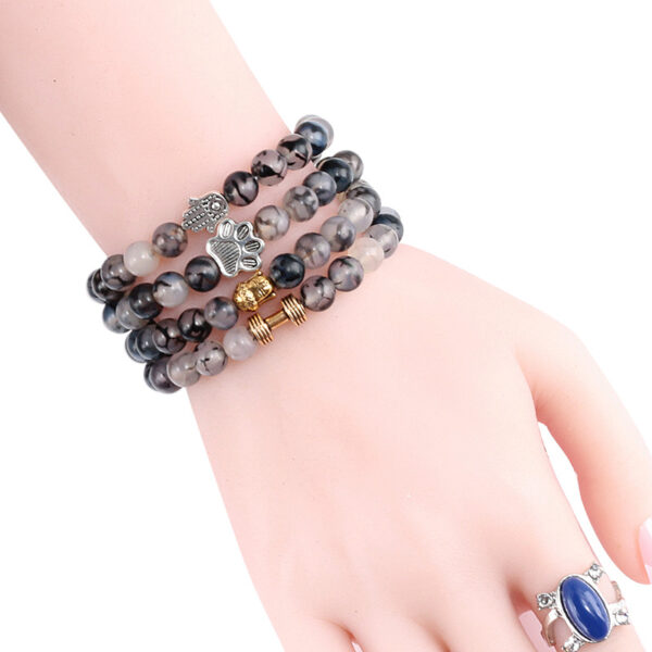 Wholesale elastic line beaded black dragon pattern bracelet alloy