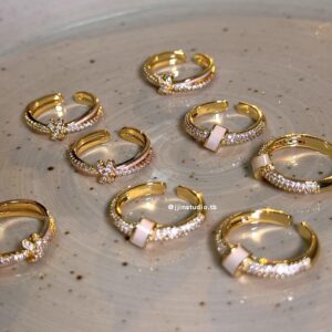 O1CN01NXtHjK1m65OVWVBhg_2209494864904-0-cib Wholesale Gentle white shell micro inlaid zircon ring