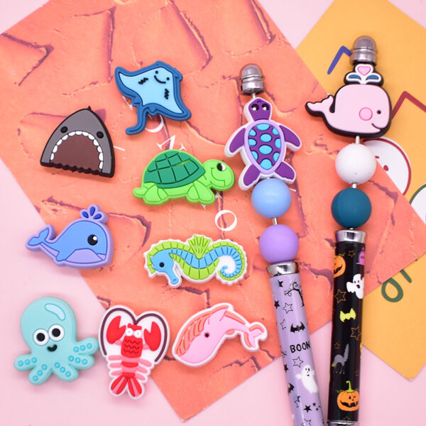 O1CN01NzW0C31t0m7GUqZ6k_2207248195840-0-cib Wholesale Random cartoon marine animals fish Focal Beads