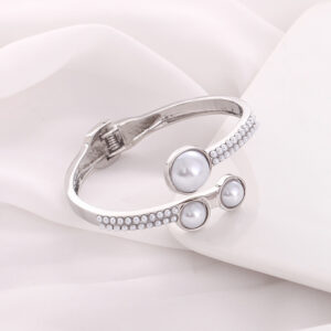 Three half pearl silver