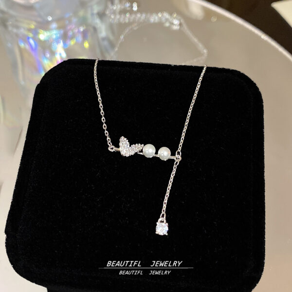 Wholesale Butterfly Pearl Tassel Necklace Lightweight Luxury