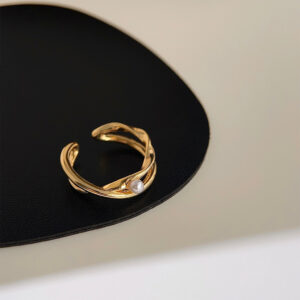 Geometric cross pearl ring