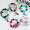 Wholesale Cross Silicone Leopard Beaded Wrist Keychain Bag Austrian Pendant