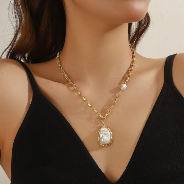 O1CN01OgYx7u1VD60jkSqvz_2466522618-0-cib Wholesale Baroque pearl pendant necklace, a hot-selling cross-border e-commerce product from Europe and America; fashionable, luxurious, and sophisticated pearl sweater chain.