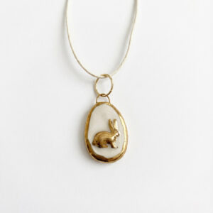 Gold frame gold rabbit necklace