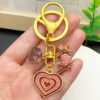 Wholesale Valentine's Day Oil Dripping Red Sprinkled Gold Keychain