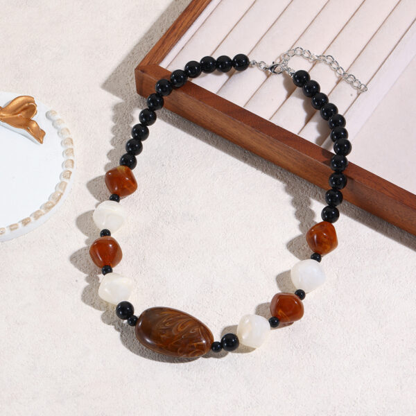 O1CN01PbI0251VD60Rcus0g_2466522618-0-cib Wholesale Elliptical beaded geometric acrylic necklace