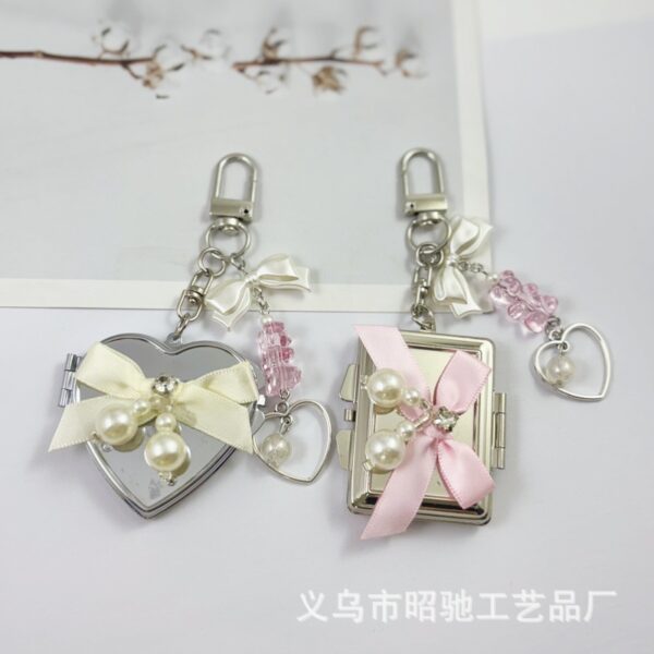 O1CN01PvAwXL20vkgXIDq4s_2550186912-0-cib Wholesale Colorful Bow Love Mirror Metal Keychain