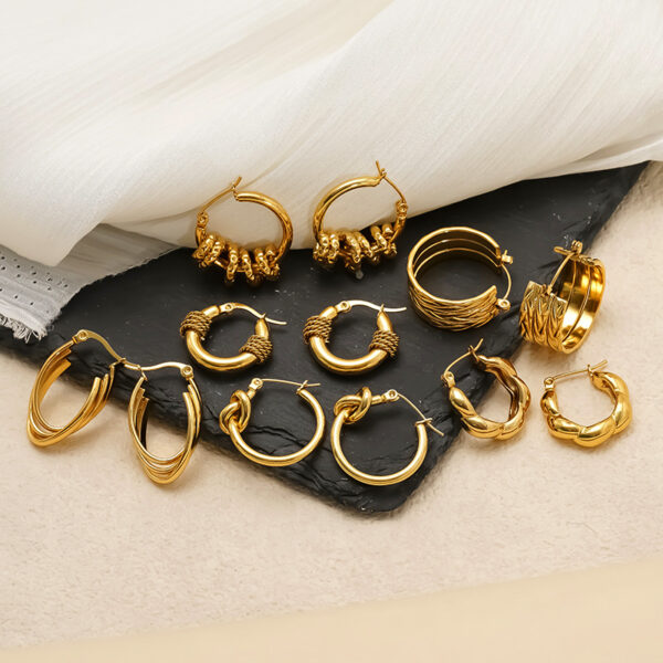 O1CN01Q3MfYF2NGI0qXSgL7_2217889189935-0-cib Wholesale Stainless steel wrapped gold geometric earrings