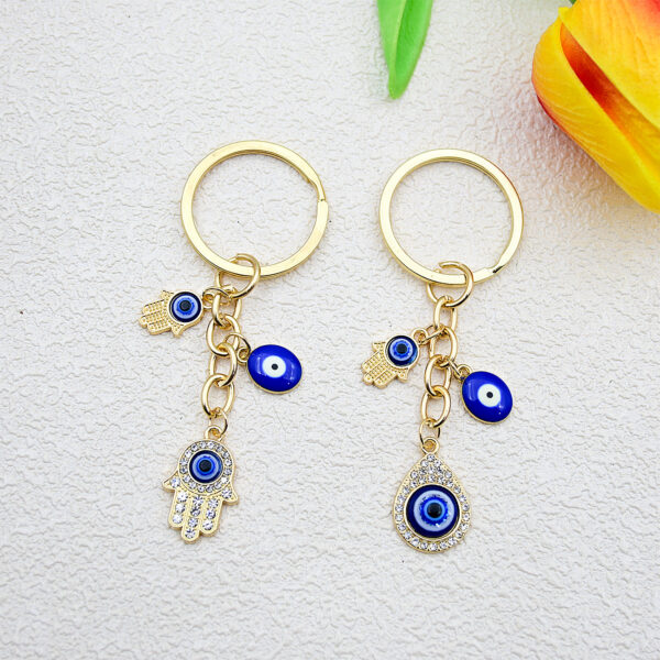 Wholesale Heart-shaped palm water droplet Devil's eye keychain