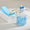 Wholesale Acrylic flowing sand bottle bag keychain