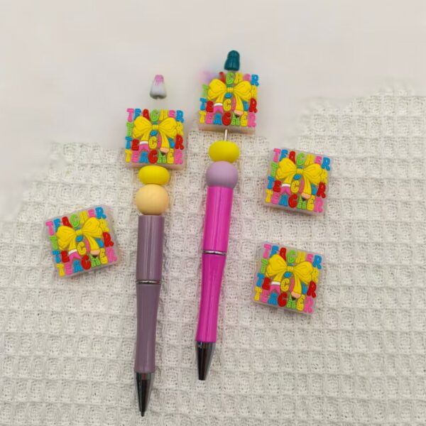 O1CN01QKfwZY2FO3ivixPzO_2216349148869-0-cib Wholesale 10pcs Creative Colorful Letter Bow Gift Box Silicone DIY Beads