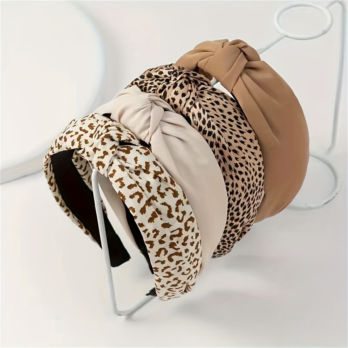 Wholesale Leopard print coee colored fabric knotted wide edge headband