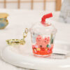 Wholesale Oil-filled acrylic doll cylindrical cup with flowing sand bottle keychain