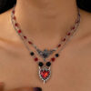 O1CN01R9NI3x23opYM5pe4y_3950707303-0-cib Wholesale Halloween Dark Gothic Butterfly Cross Bat Skull Necklace Set