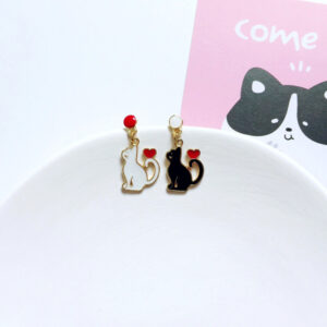 Asymmetrical black and white heart cat earrings (pair)