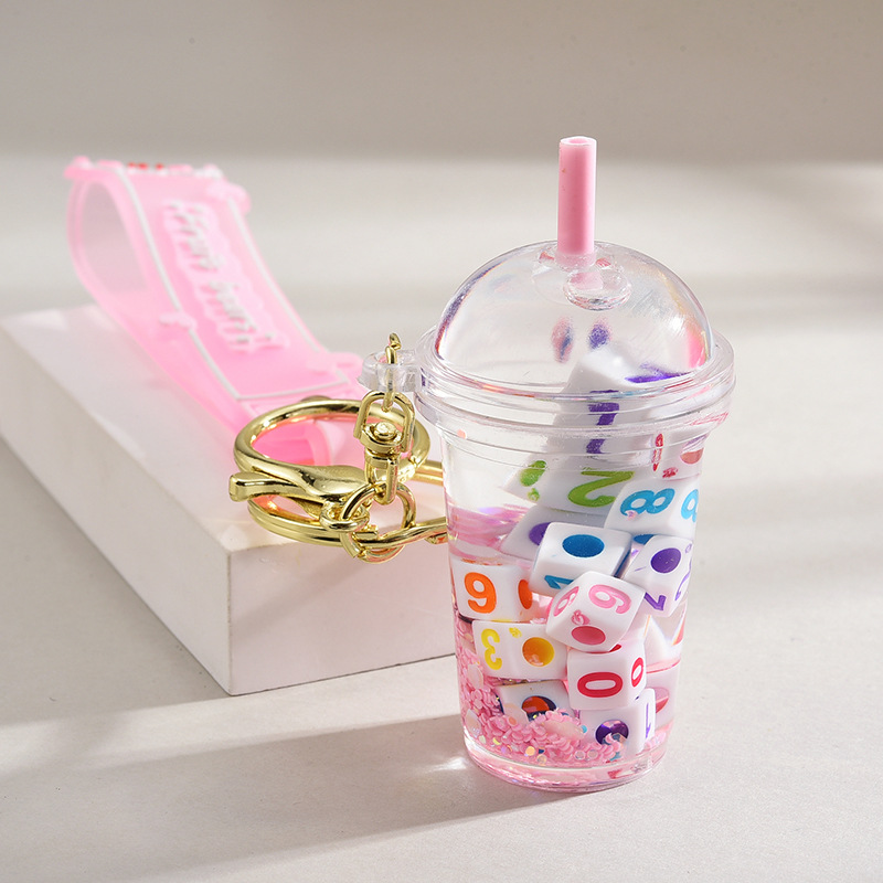 Wholesale Acrylic flowing sand bottle milk tea c keychain