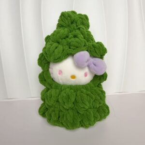 White pre-made green Christmas tree headgear, doll not included.