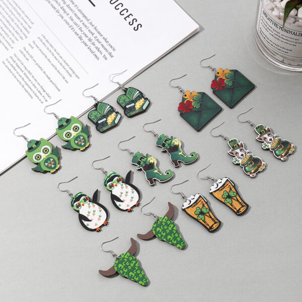 O1CN01RWaUVy2KAqGrheYzF_2209316649517-0-cib Wholesale St. Patrick's Day animal lucky grass rainbow wooden earrings