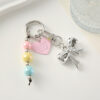 Wholesale Colored bead heart shaped bow metal keychain
