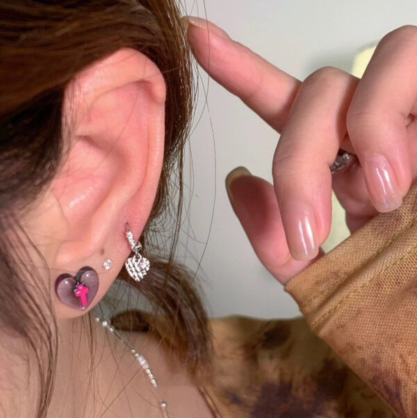 Wholesale Dark cross anti-allergic heart stud earrings