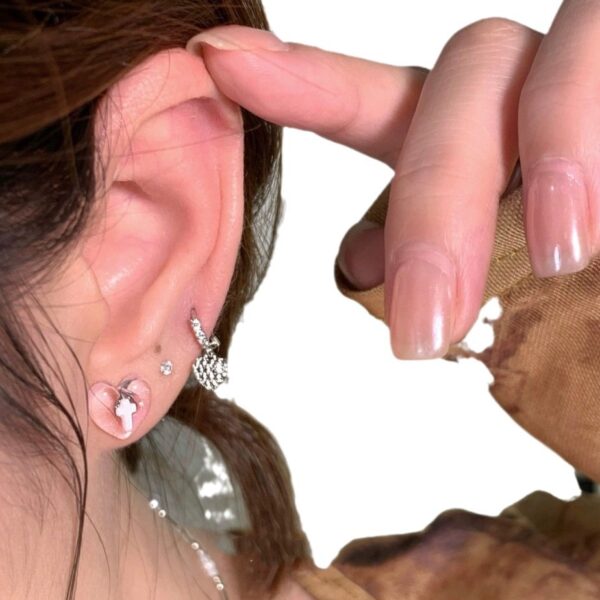 Wholesale Dark cross anti-allergic heart stud earrings