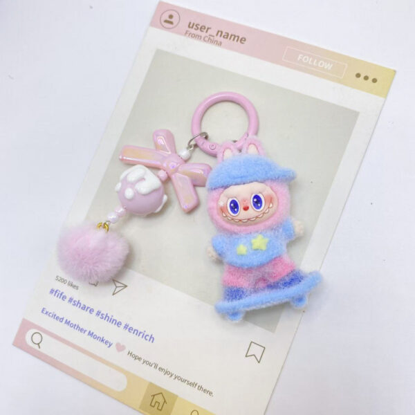 O1CN01SFeaFG1qBMQW0e9wO_2219486535457-0-cib Wholesale Flocked Skateboard Cute Doll Keychain OLY Exclusive