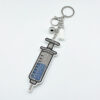 Wholesale Diamond-studded syringe keychain fashionable tassel pendant