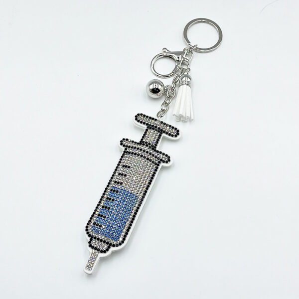 Wholesale Diamond-studded syringe keychain fashionable tassel pendant
